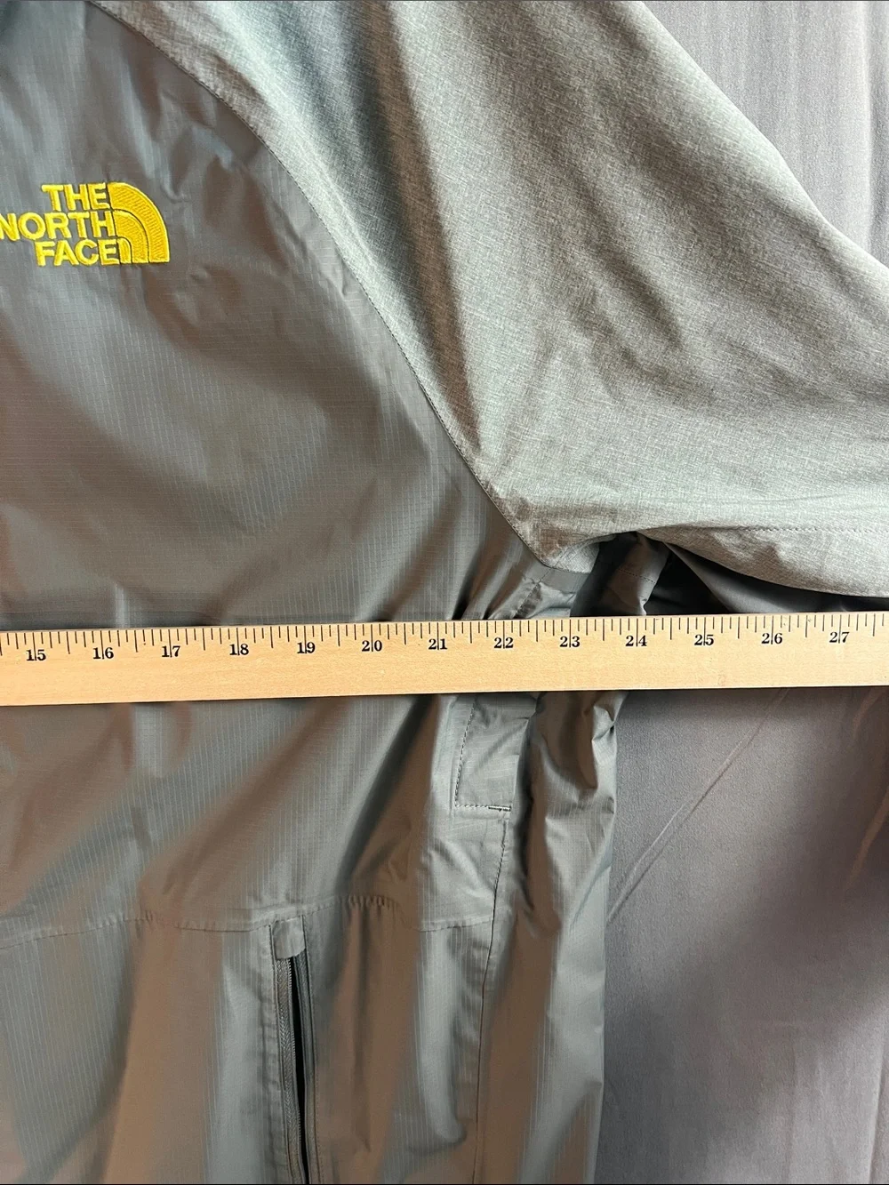 The North Face waterproof men’s XL HyVent 2.5L Shell with Yellow Logo